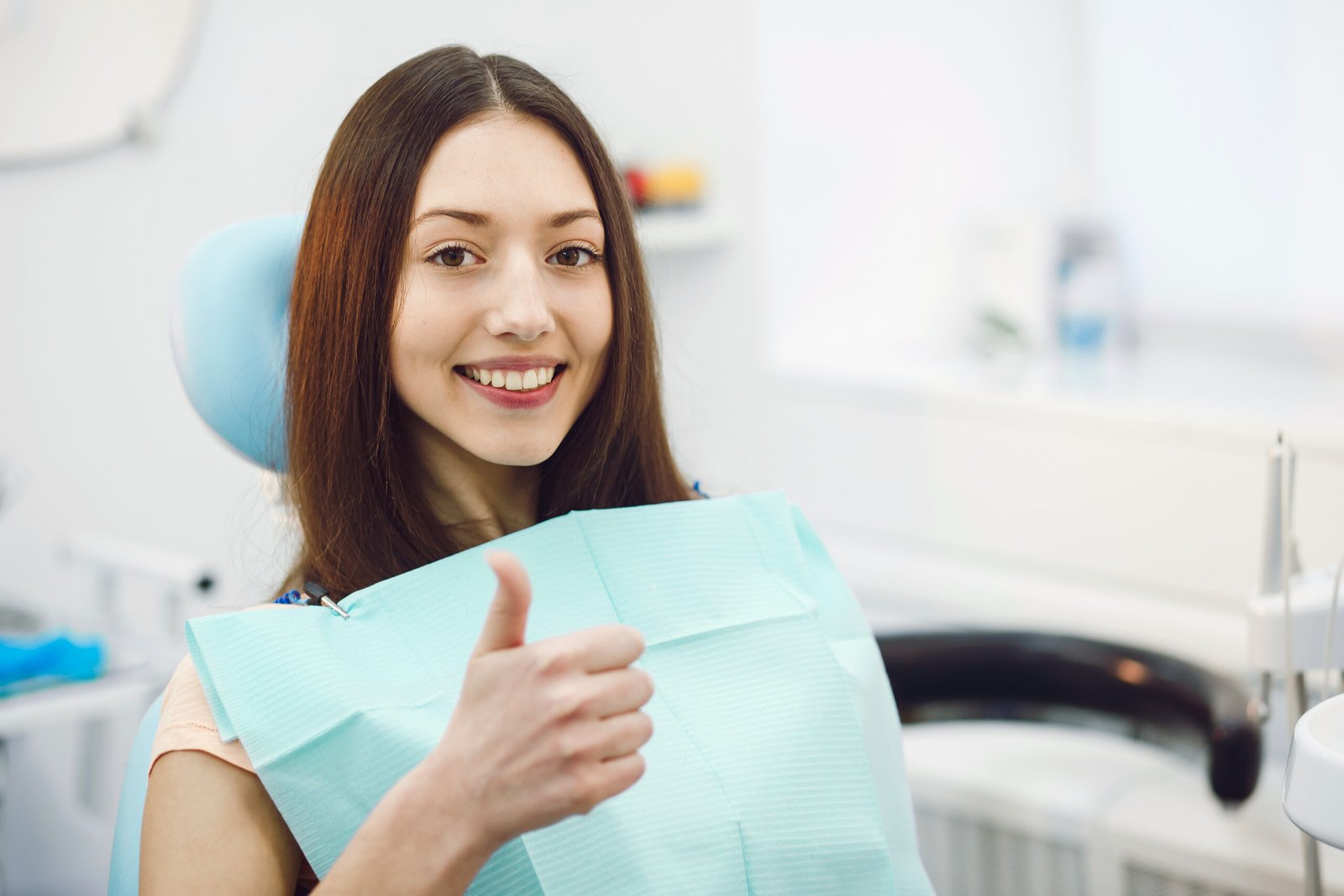 Smiling patient relieved after Beverly Hills Dental Emergency treatment